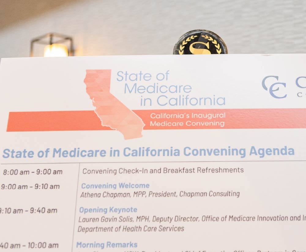 Photo of a sign with the convening agenda.